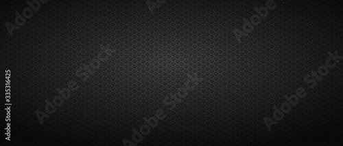 Black mosaic backdrop with hexagonal tiling