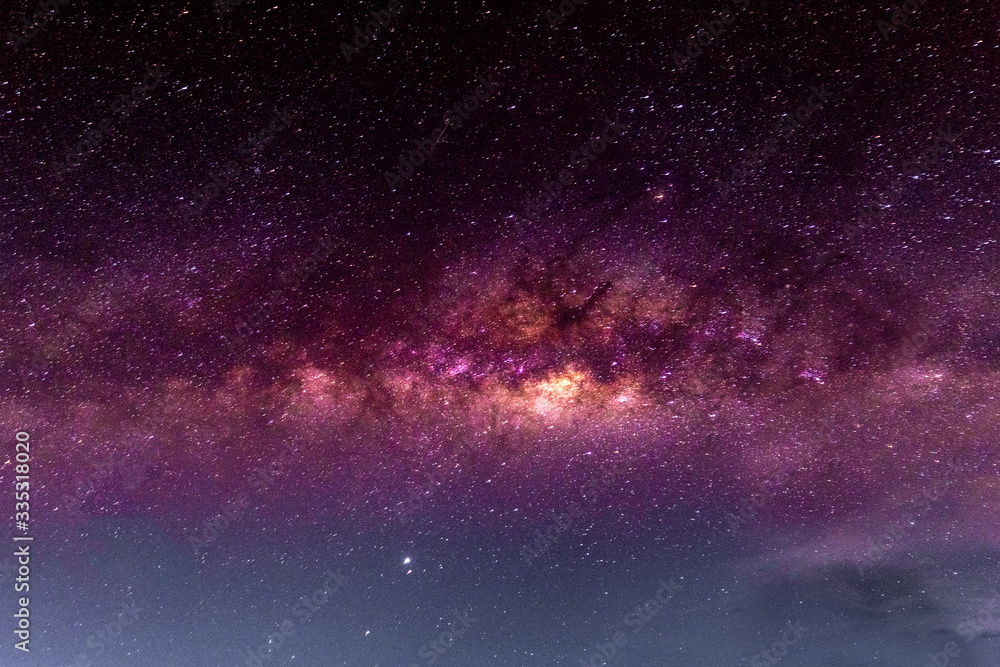 Fototapeta premium Night scenery with colorful and light yellow Milky Way Full of stars in the sky in summer Beautiful universe Background of space
