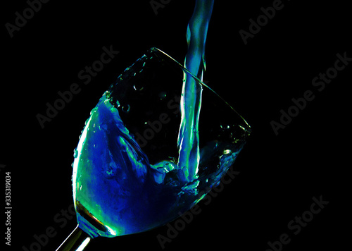 glass of liqueur on a black background
