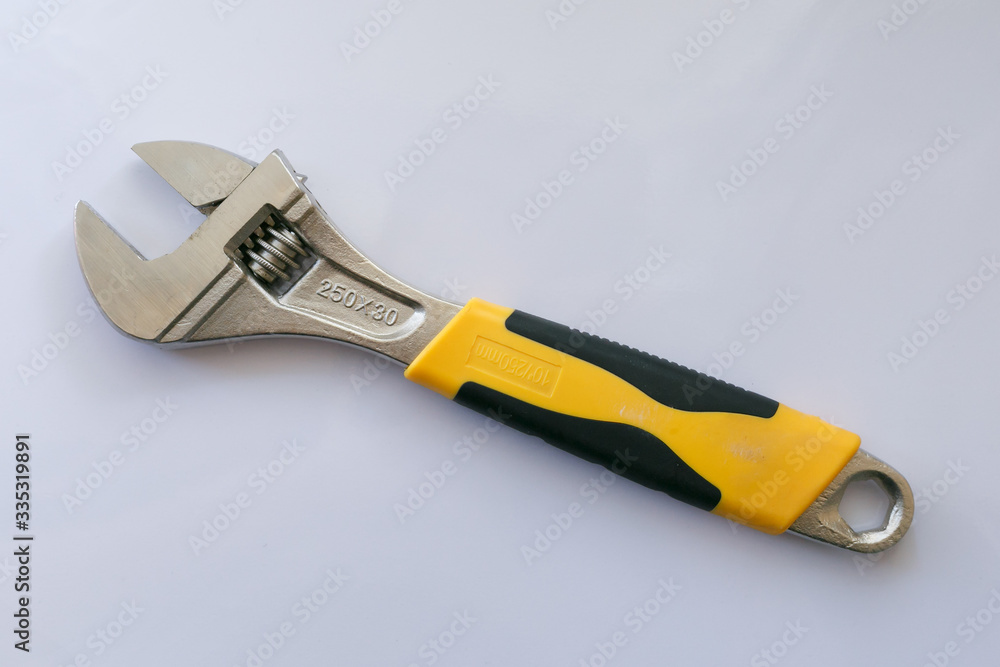 Obraz premium adjustable wrench on a white background