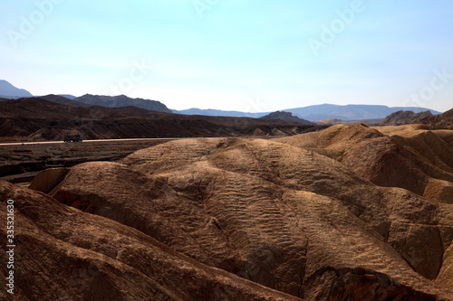 California / USA - August 22, 2015: The landscape and rock formations around Zabriskie point near Death Valley National Park, California, USA photo