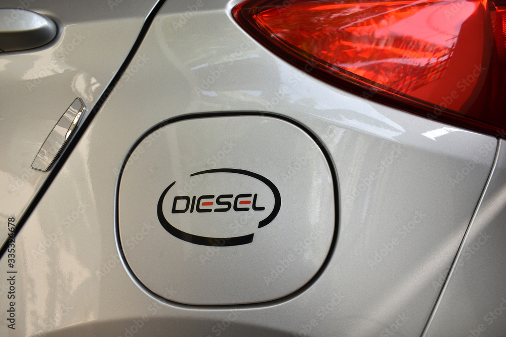 Obraz premium Car fuel tank lid with diesel printed sticker