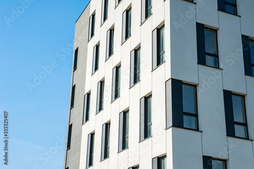 White and grey facade of modern office building