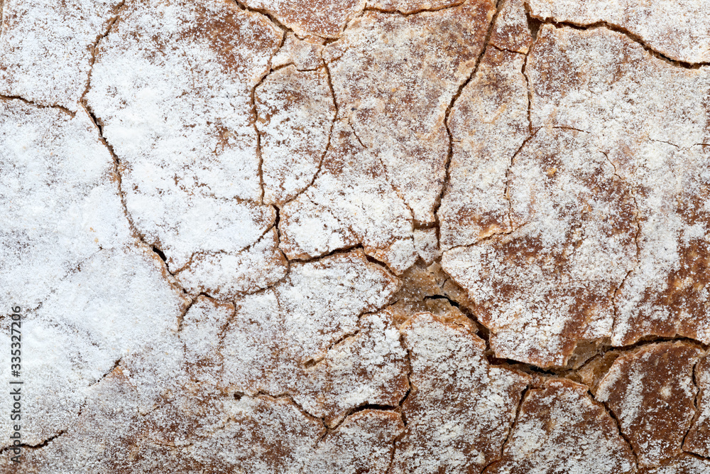 Crispy rustic homemade bread texture. Close-up of whole rye bread. Copy space. Crispy rustic homemade bread texture. Close-up of whole rye bread. Copy space.