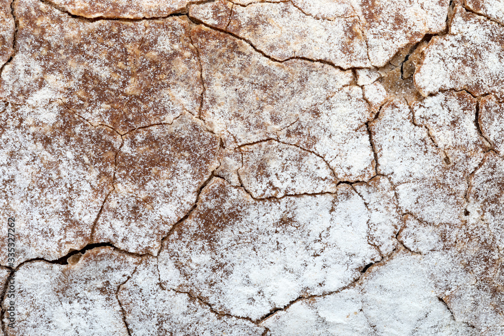 Crispy rustic homemade bread texture. Close-up of whole rye bread. Copy space. Crispy rustic homemade bread texture. Close-up of whole rye bread. Copy space.