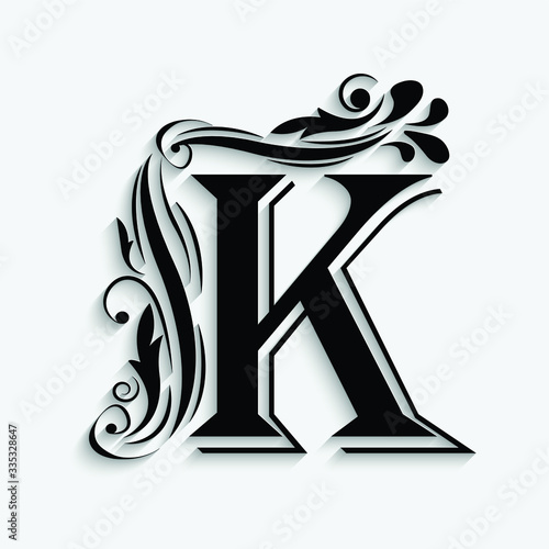 letter K. Black flower alphabet.  Beautiful capital letter with shadow