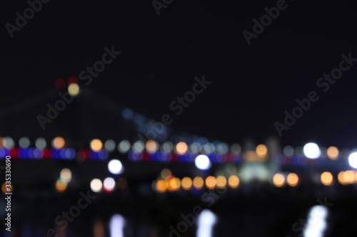 city lights at night with a bokeh blur © SparkerLit Studio