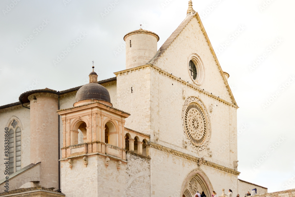 Assisi, Italy. Just arrived in this little town from a pilgrimage on the Saint Francis way, the view of the church dedicated to the saint indicates the end of the trip and the time to rest Assisi, Italy. Just arrived in this little town from a pilgrimage on the Saint Francis way, the view of the church dedicated to the saint indicates the end of the trip and the time to rest