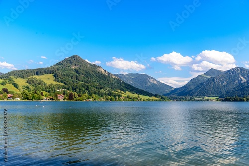 Schliersee  Bavaria  Bayern  Germany. Beautiful view on lake with alps mountains  blue sky with clouds. 