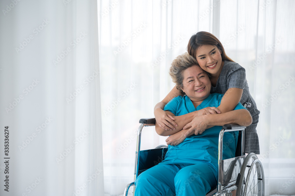 Teenage daughter visits the ill mother in the hospital Teenage daughter visits the ill mother in the hospital