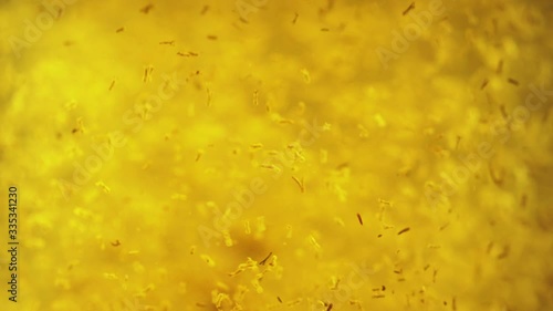 Macro footage of kettle full of tea inside, chamomile tea