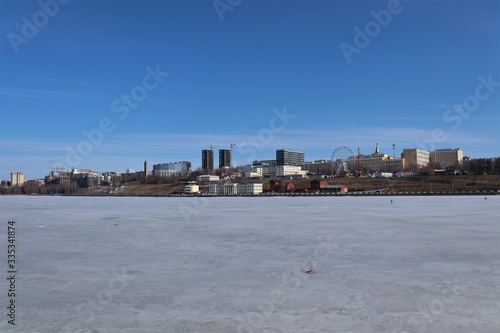 A frozen pond on the banks of which the city is located.