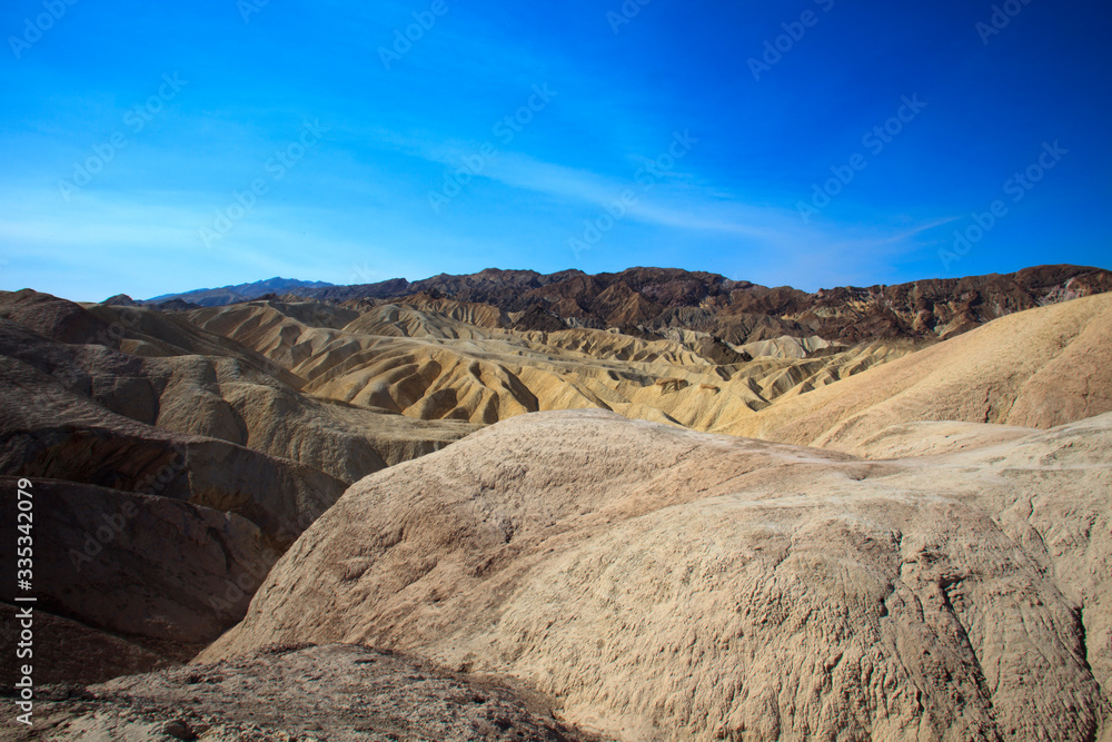 Naklejka premium California / USA - August 22, 2015: The landscape and rock formations around Zabriskie point near Death Valley National Park, California, USA
