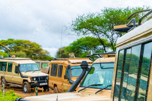 Photography Open roof 4x4 safari jeeps on african wildlife safari in Tanzania