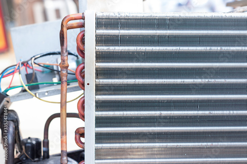Принти на полотні The air conditioner coil is a part of the system where the refrigerant absorbs heat