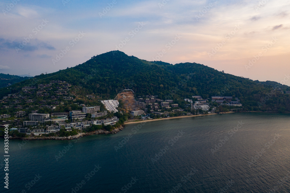 Aerial drone view of tropical Kamala Beach area and Andaman Sea in Phuket, Thailand