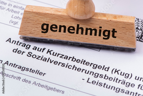 Wallpaper Mural Antrag auf Kurzarbeitergeld mit Holzstempel und Aufschrift genehmigt Torontodigital.ca