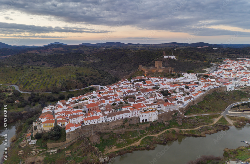 Aerial drone view of Mertola in Alentejo, Portugal at sunset