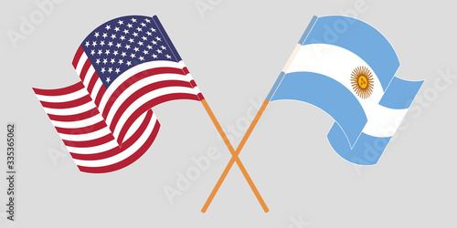Crossed and waving flags of Argentina and the USA