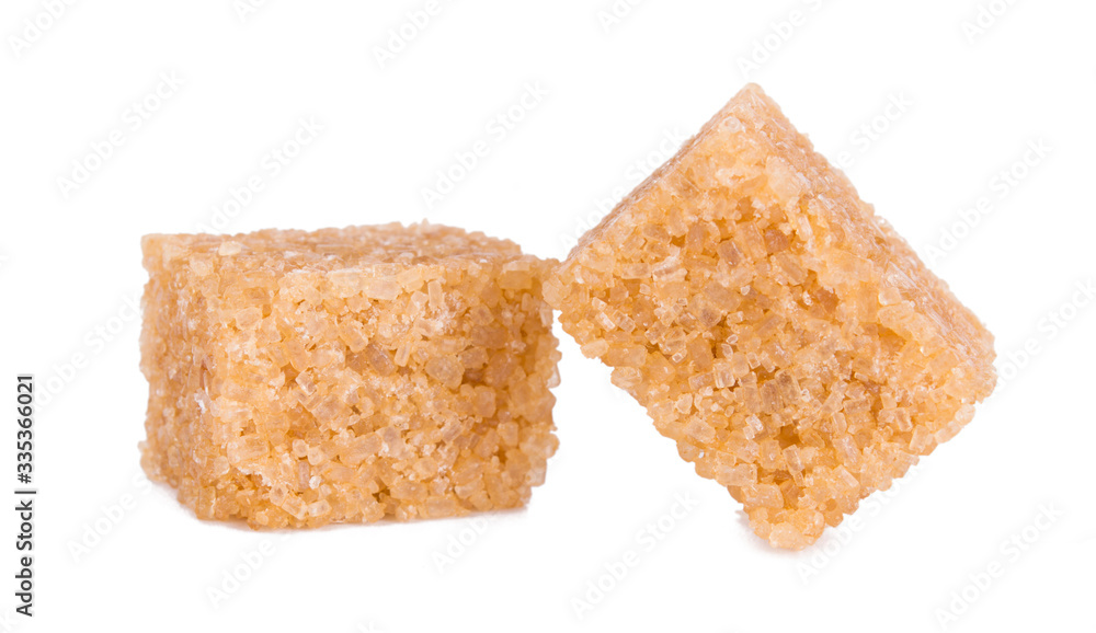 brown sugar cubes isolated on white background with clipping path. brown sugar cubes isolated on white background with clipping path.