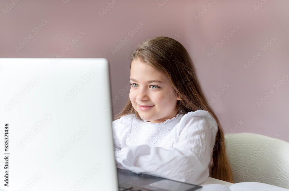 Distance learning online education. Stay home. Covid-19 Coronavirus and Learning from home. Sickness school girl studying at home with digital tablet laptop notebook and doing homework. Distance learning online education. Stay home. Covid-19 Coronavirus and Learning from home. Sickness school girl studying at home with digital tablet laptop notebook and doing homework.