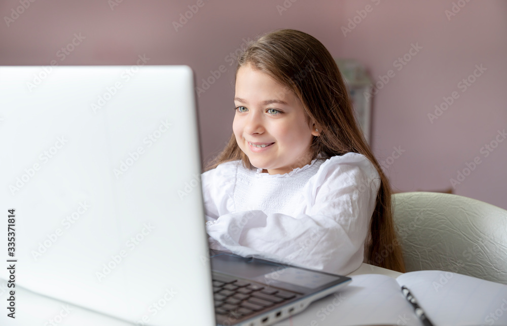 Distance learning online education. Stay home. Covid-19 Coronavirus and Learning from home. Sickness school girl studying at home with digital tablet laptop notebook and doing homework. Distance learning online education. Stay home. Covid-19 Coronavirus and Learning from home. Sickness school girl studying at home with digital tablet laptop notebook and doing homework.