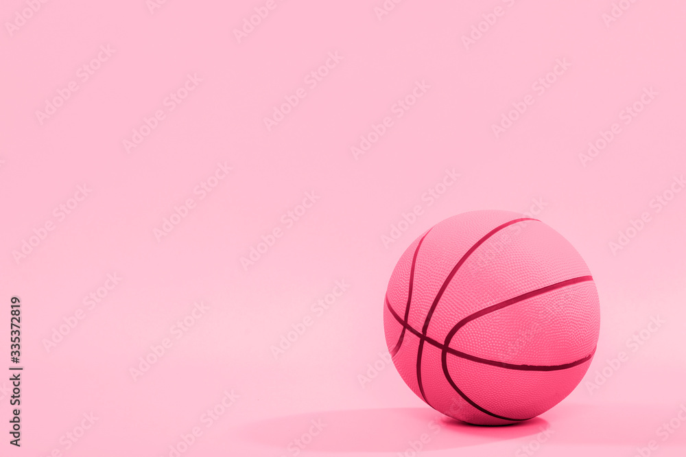 Basketball ball isolated on pink background. Basketball ball isolated on pink background.