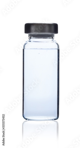 Vial Bottle of medical ampoule with blue liquid with reflection isolated on a white background. The science Hyaulonic acid, anesthetic,