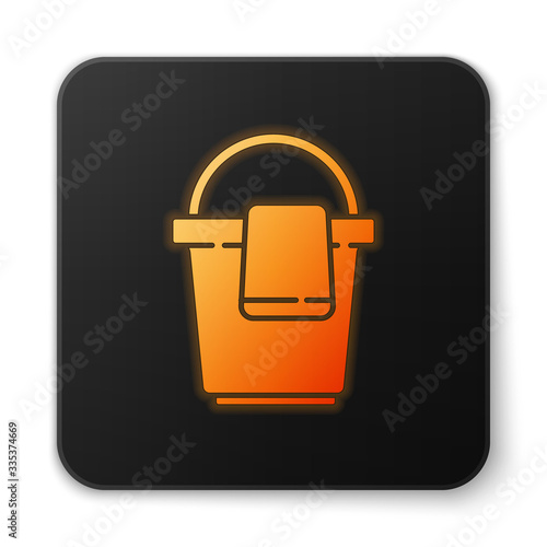 Orange glowing neon Bucket with rag icon isolated on white background. Cleaning service concept. Black square button. Vector Illustration