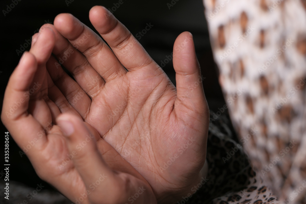 muslim women with head scarf praying, close up muslim women with head scarf praying, close up