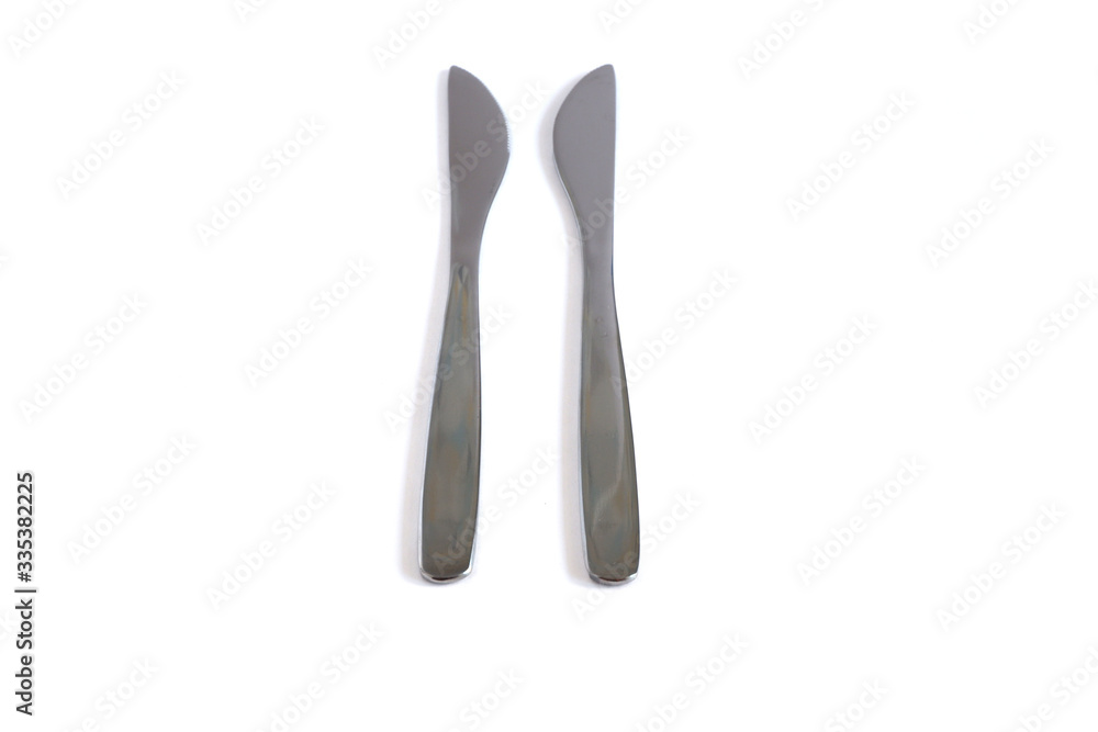Dessert knives on a white background Dessert knives on a white background