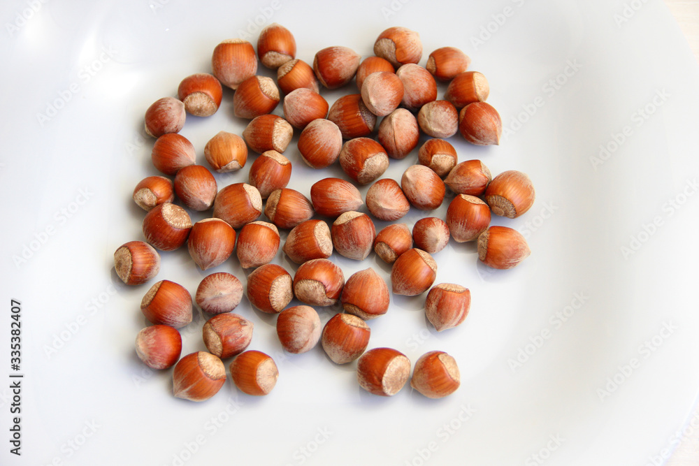 hazelnuts on a white plate