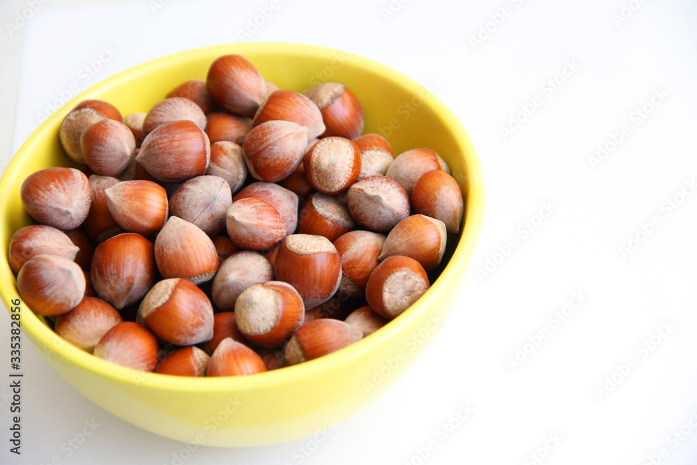bowl of hazelnuts bowl of hazelnuts