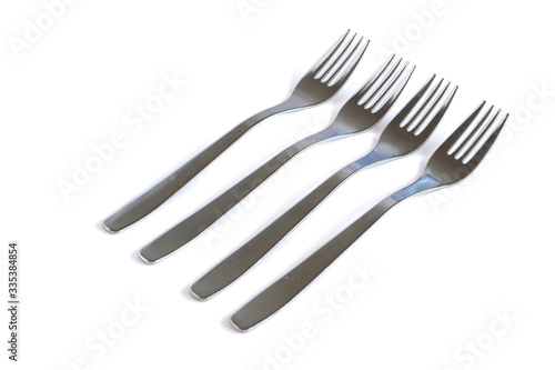 Dessert forks on a white background