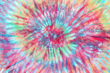 swirl tie dye pattern hand dyed on cotton fabric abstract texture background.