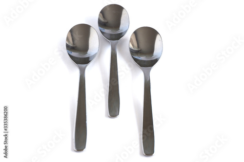 Dessert spoons on a white background