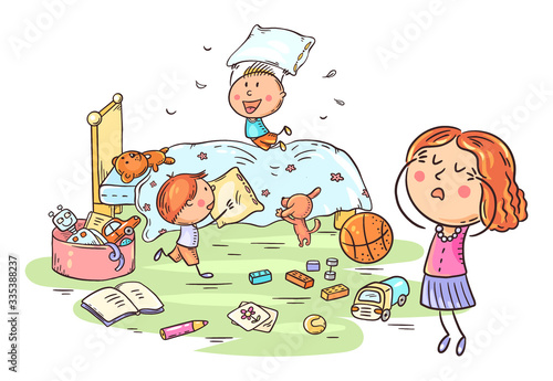 Pillow fight of kids in the bedroom with a tired mother