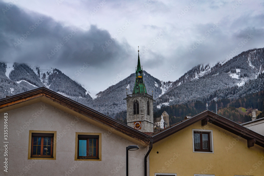 urban landscape with views of the church and mountains in the vicinity of Schwaz