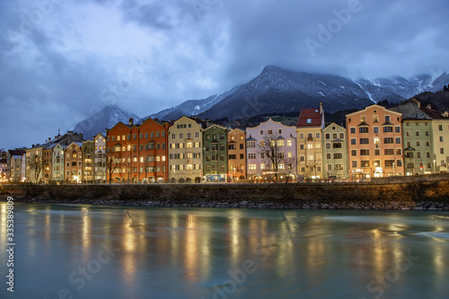 Night view of the Innsbruck promenade overlooking the mountains