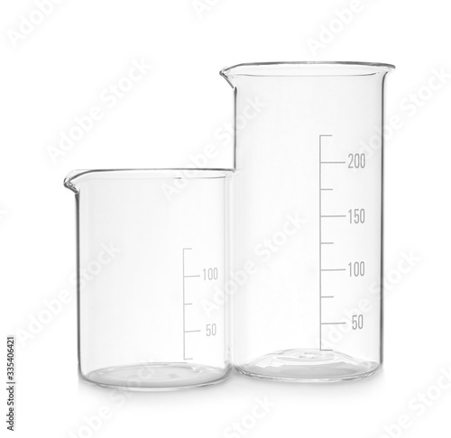 Empty beakers on white background. Laboratory glassware