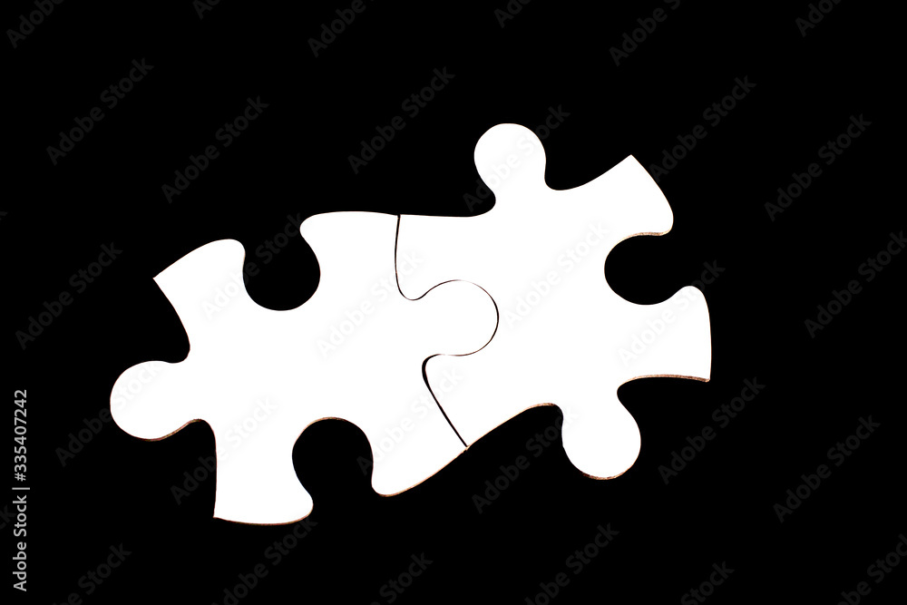 Obraz premium Puzzle Piece on black background