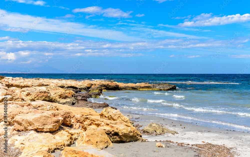 View on the mediterranean sea, blue sky. shore near Alicante, Spain