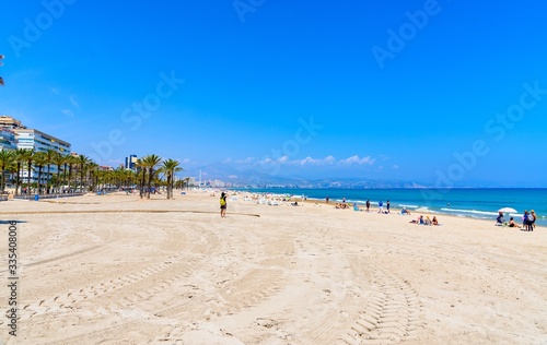 Canvastavla Beach Playa San Juan Alicante, Spain. Blue sky, clouds, sea.