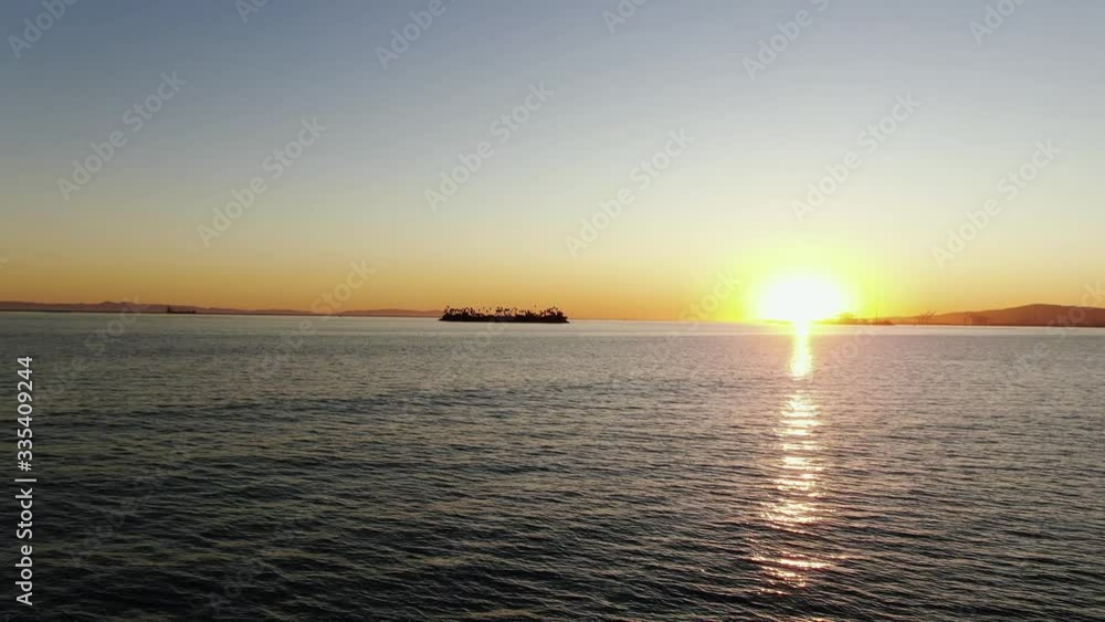 Nice view on the California Long Beach - orange sunset and houses Nice view on the California Long Beach - orange sunset and houses