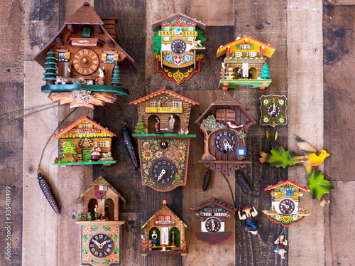 Colorful handpainted vintage cuckoo clocks photo