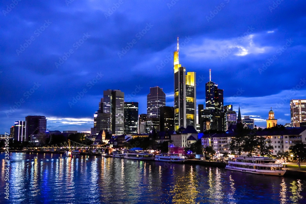 Beautiful view on  Frankfurt am Main skyline cityscape during twilight blue hour, suntset. Hessen, Germany