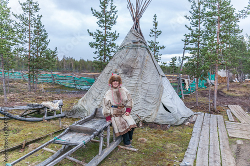 female sami in national dress, sami village on the Kola Peninsula, Russia.