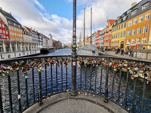 A romantic place in Copenhagen where lovers leave a sign of their love - Denmark nPhoto of february 2020 nNyhavn water channel, characteristic of a busy city that is full of typical ideas of the city, photo
