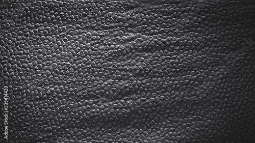 Background of a dark gray napkin with convex shapes
