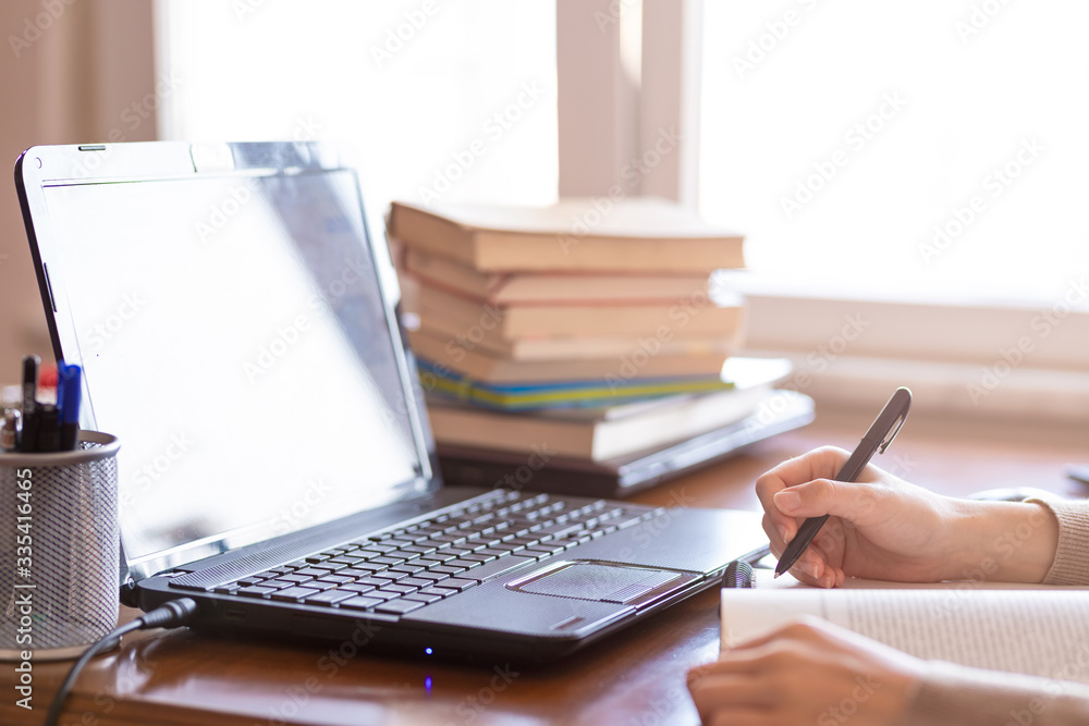 laptop notepad and books for distance education laptop notepad and books for distance education